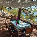 A Small Stone House By The Sea, In A Wineyard